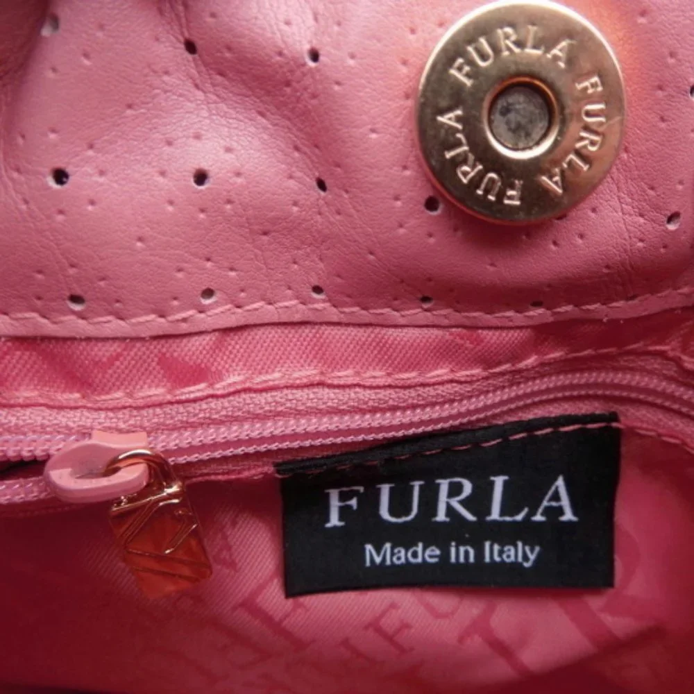 NWT Furla Shoulder bag Salmon pink Straps Bucket Perforated leather Italy Pouch